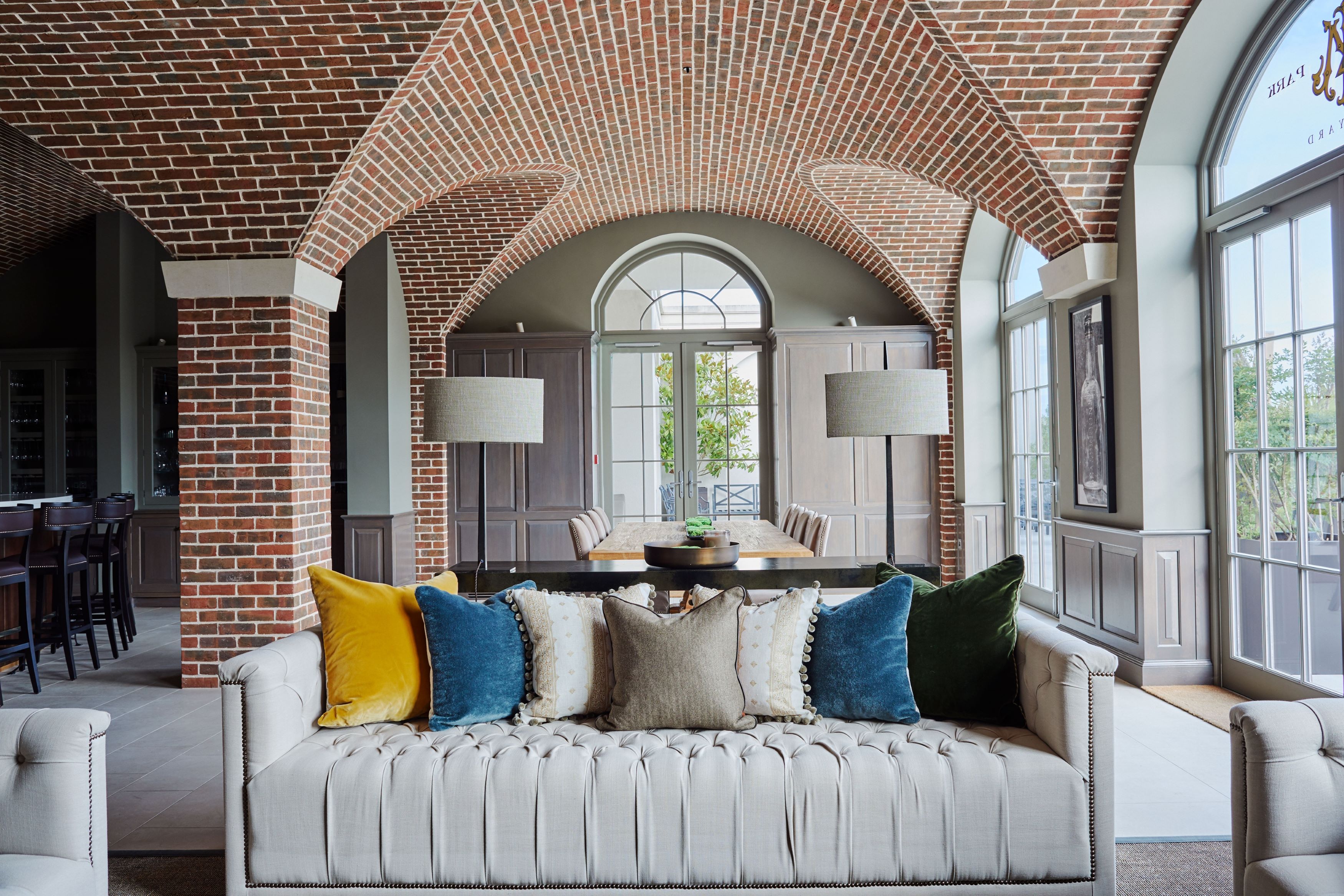 Exton Hall meeting space with elegant arches, ideal for networking events and discussions.