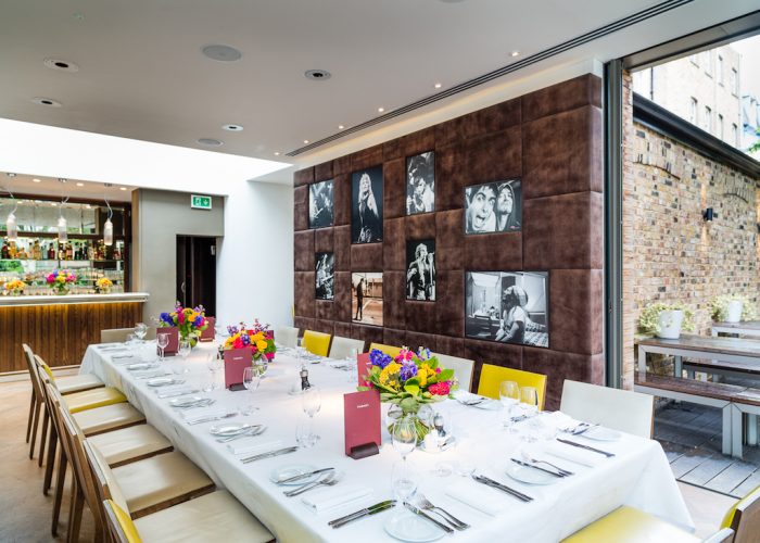 Elegant dining setup at The Conservatory for intimate gatherings and corporate events.