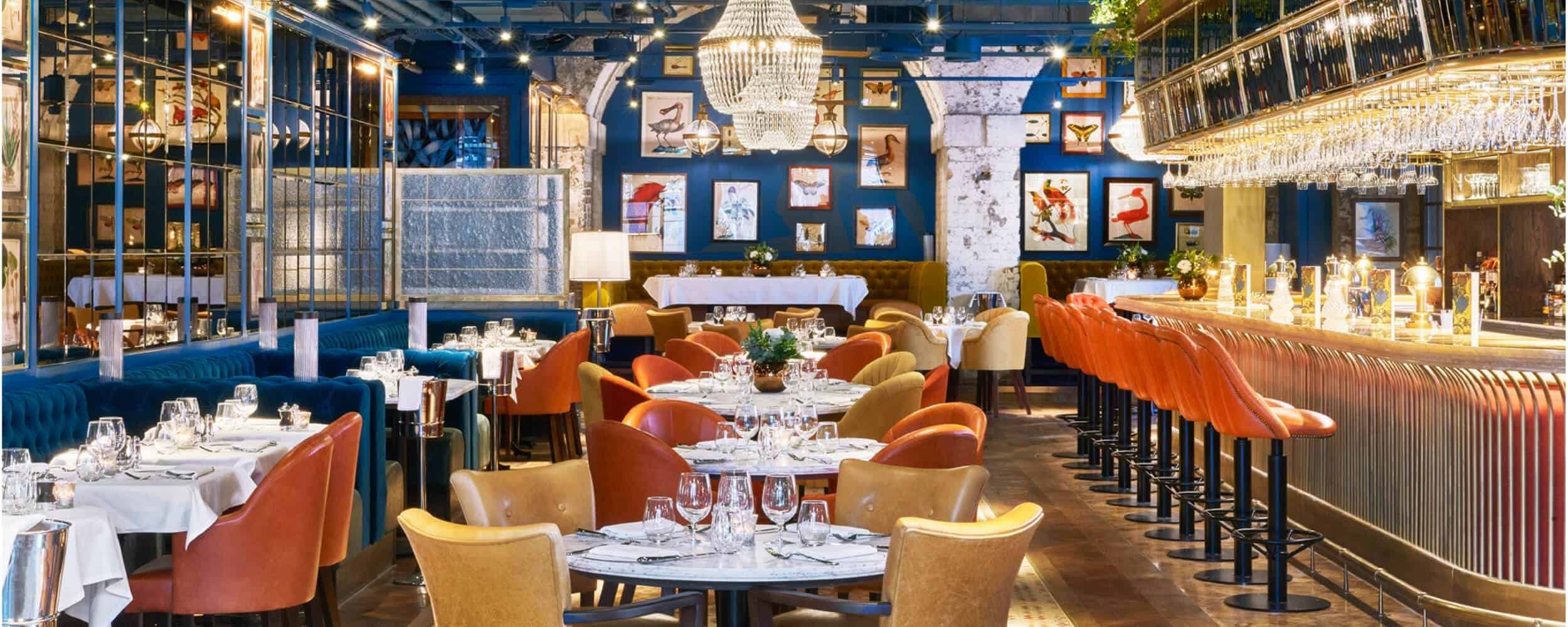 Stylish restaurant lounge with vibrant decor, perfect for events and gatherings.