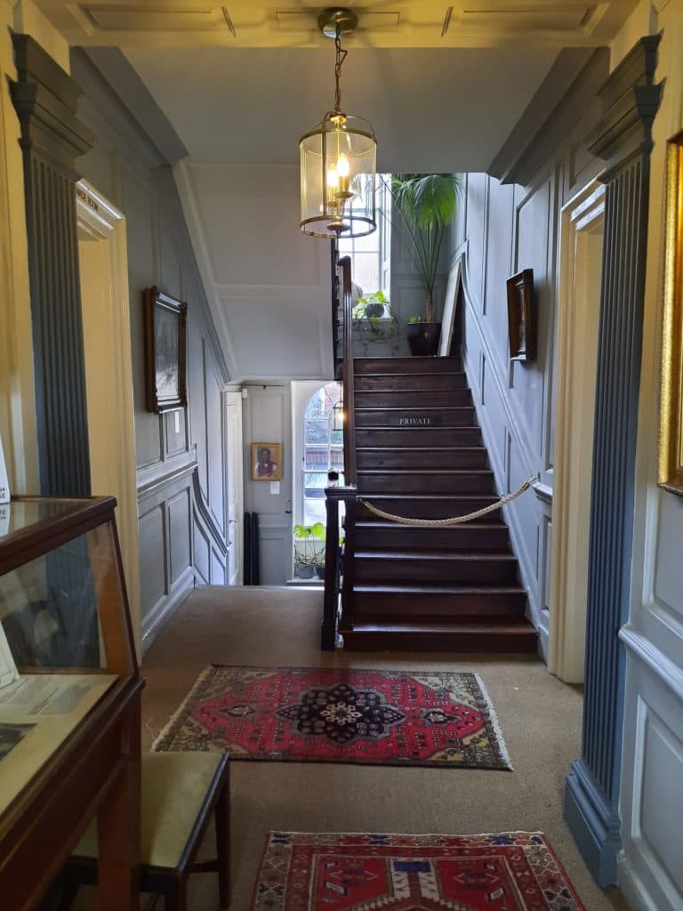 Charming staircase at Burgh House Café, perfect for intimate events and gatherings.