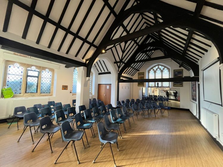 St. Peter's Hall with high ceilings, ideal for workshops and presentations.