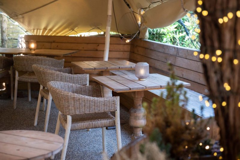 Cozy outdoor seating area in The Lord Nelson garden, perfect for networking events.