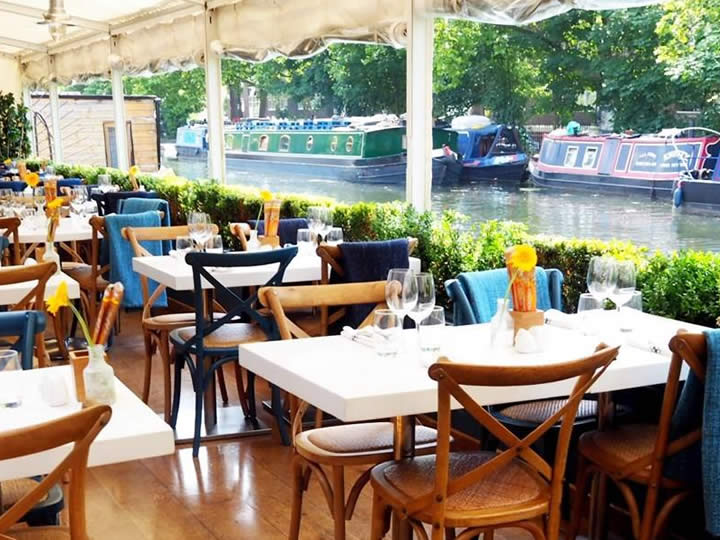 Charming riverside dining room for intimate gatherings and corporate events.