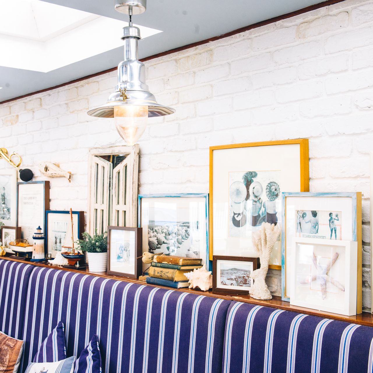 Dining room at The Summerhouse with coastal decor, ideal for events and networking.