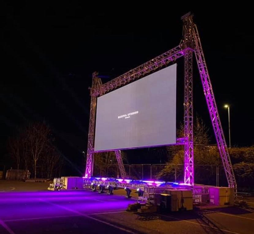 Outdoor LED screen with purple lighting for film screenings and events in Berkshire.