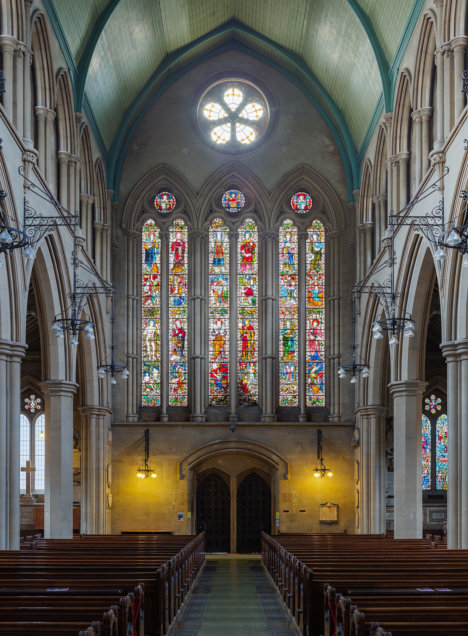 Long Room in St Mary Abbots Church Hall with stained glass, perfect for events and ceremonies.