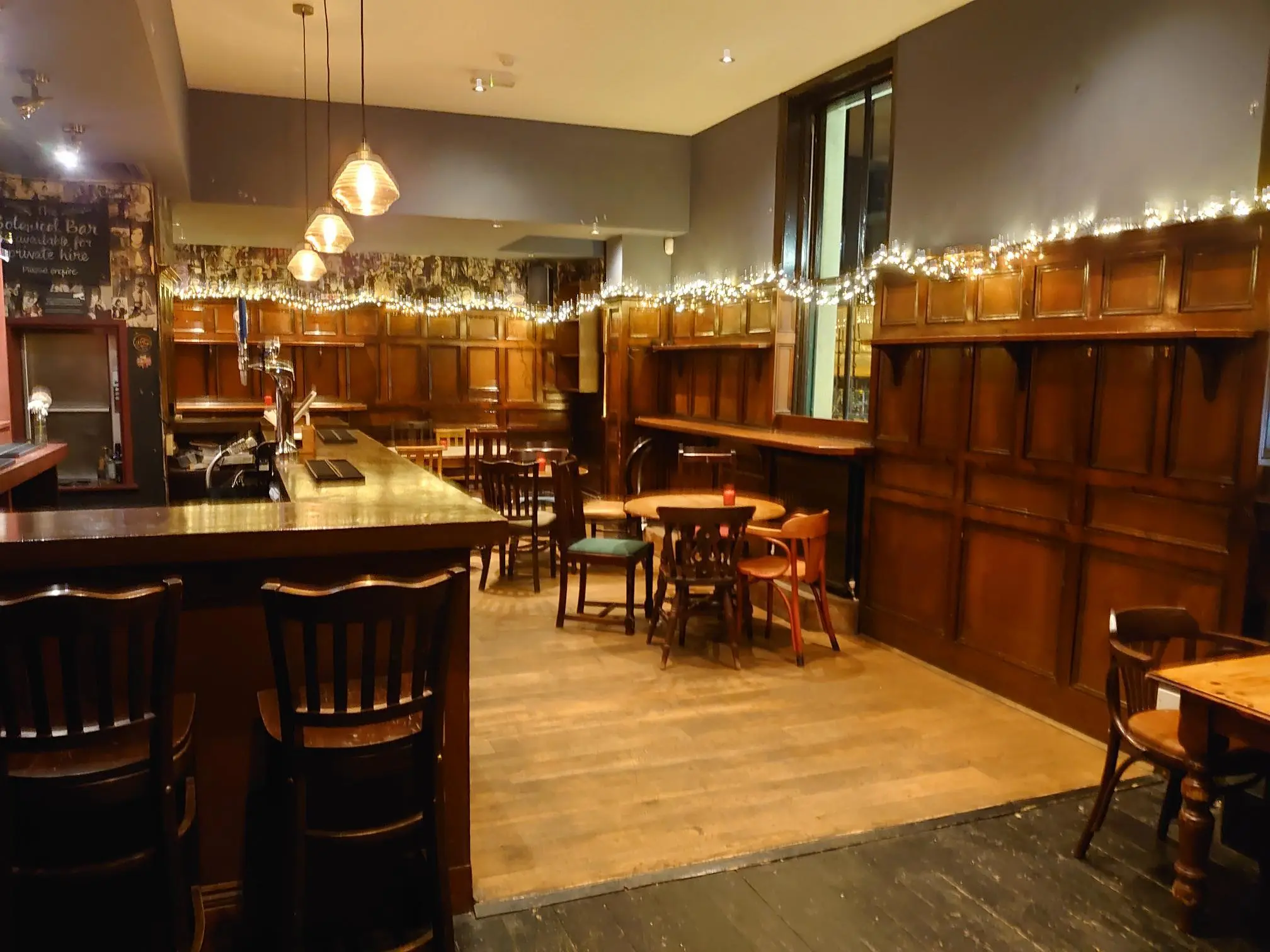 Cozy pub with warm wood accents, ideal for networking events and celebrations.