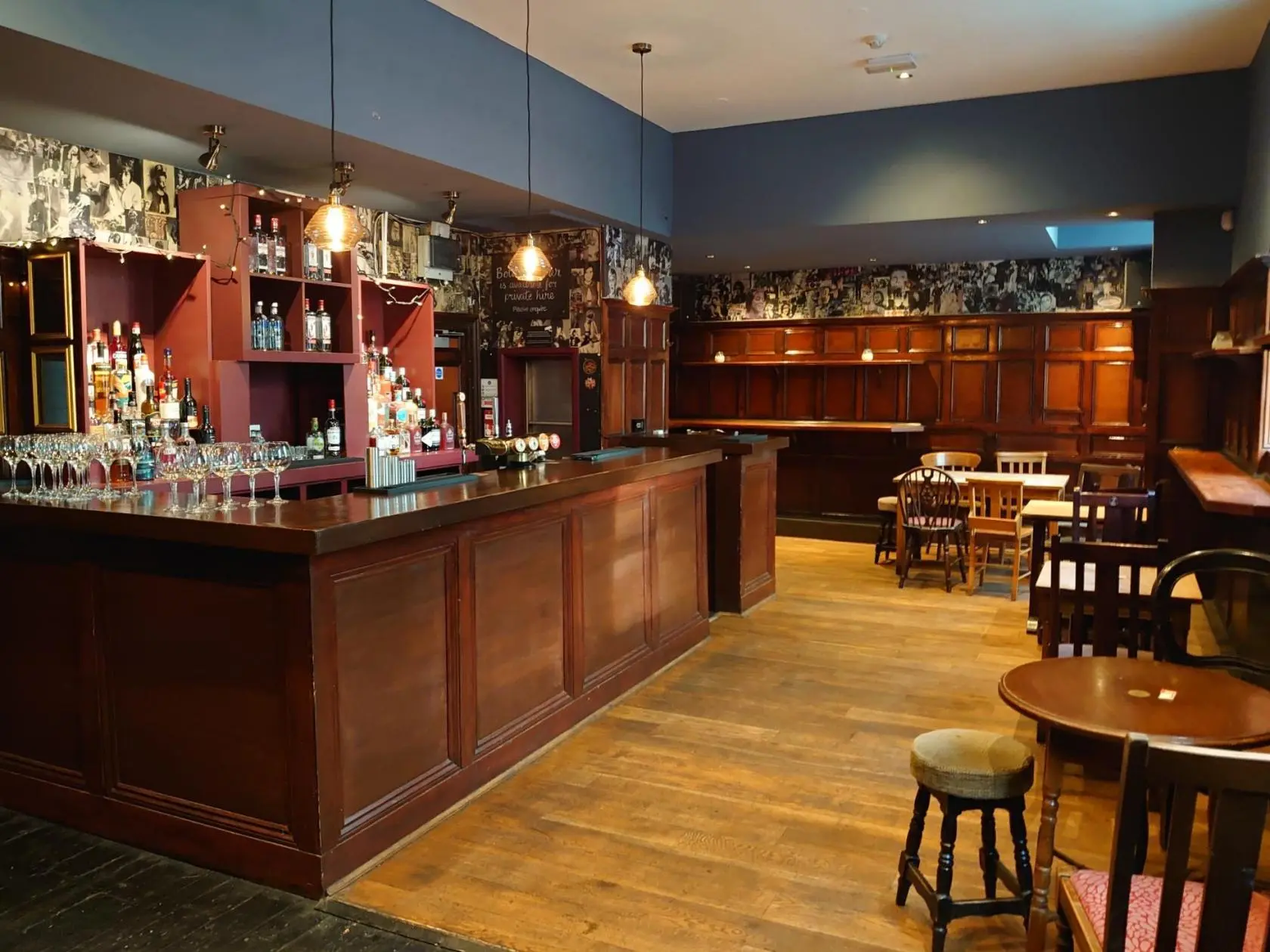 Stylish bar at The Pub in The Oliver Conquest, perfect for networking events and gatherings.