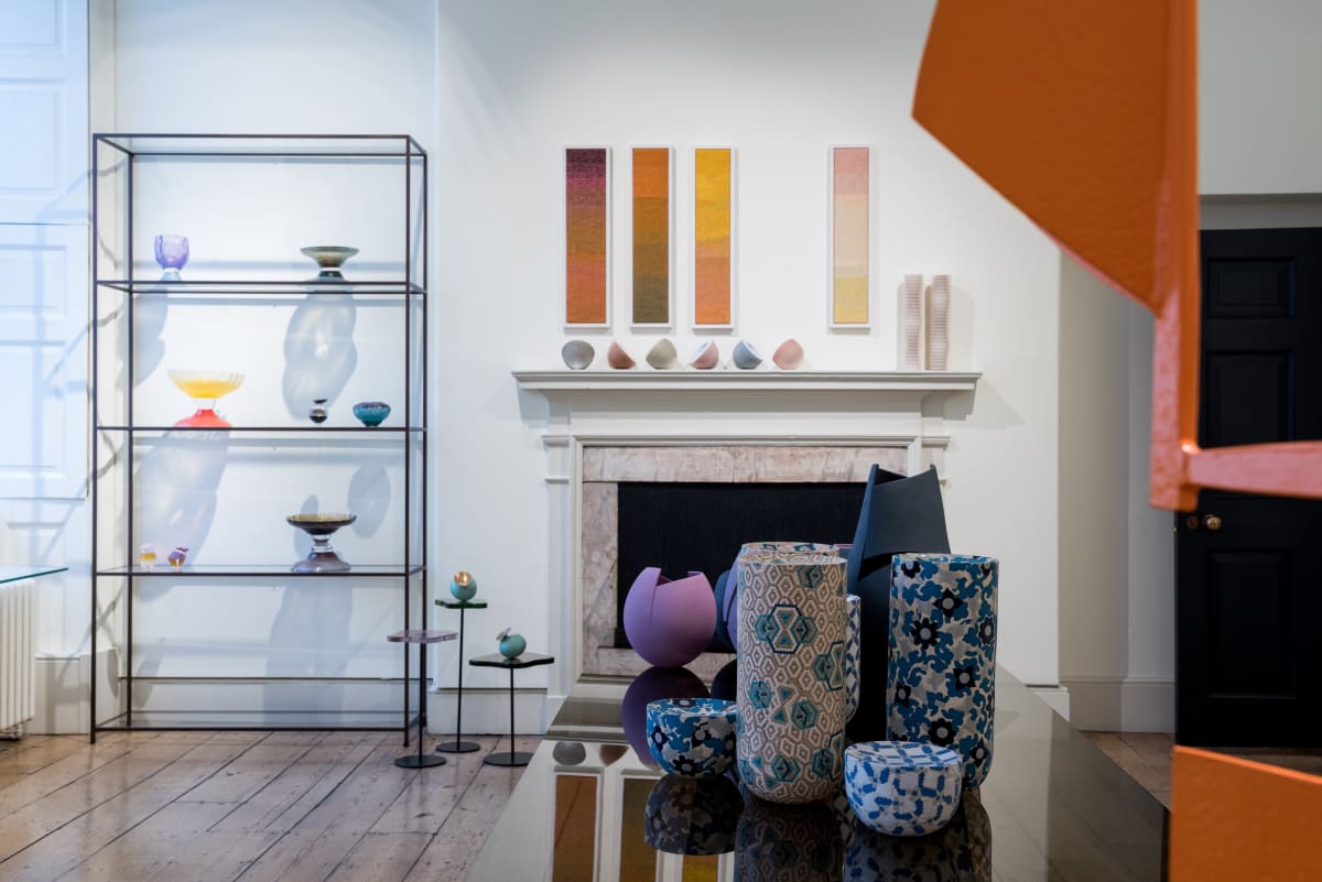 Stylish event space at Abacus Arts with vibrant decor for gatherings and workshops.