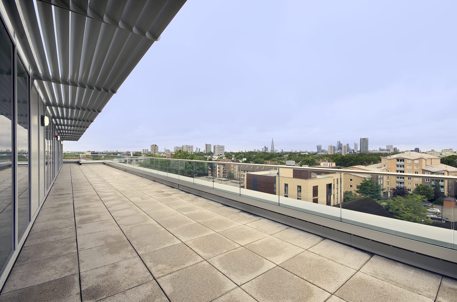 Spacious outdoor terrace at Gather, ideal for networking events with city skyline views.