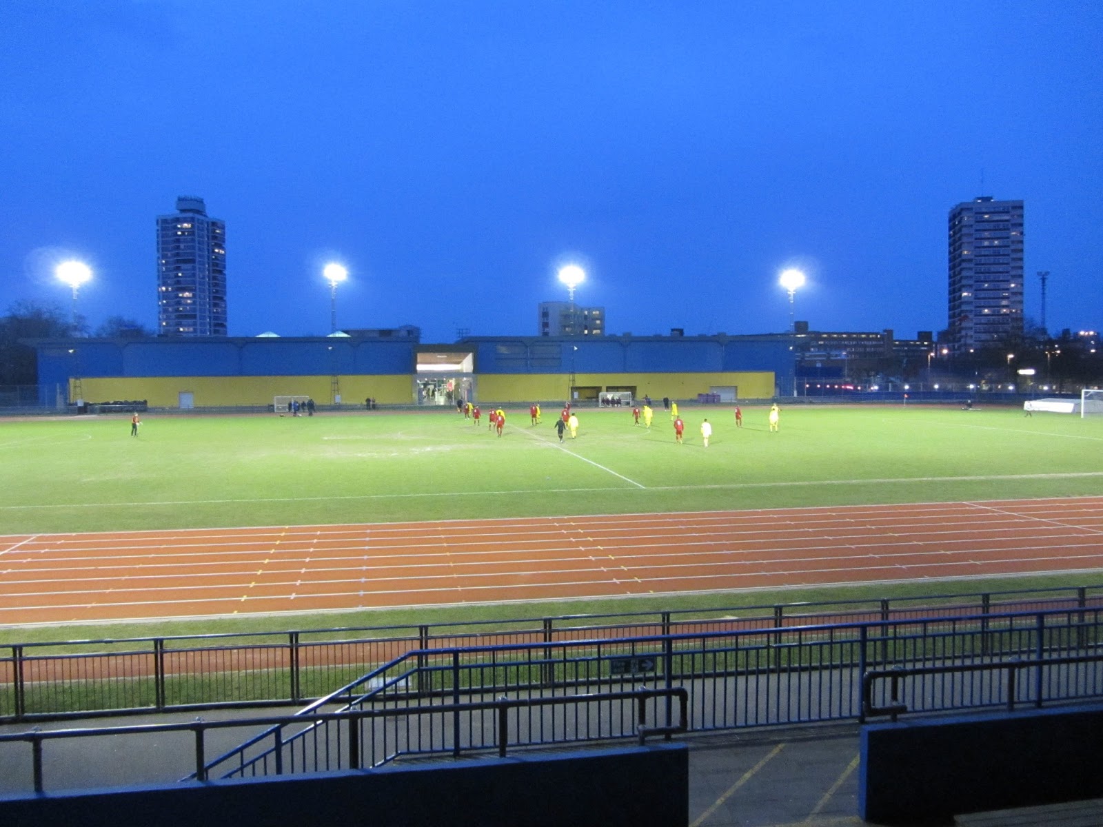 Athletics Stadium at Mile End Park, illuminated field for outdoor events and gatherings.