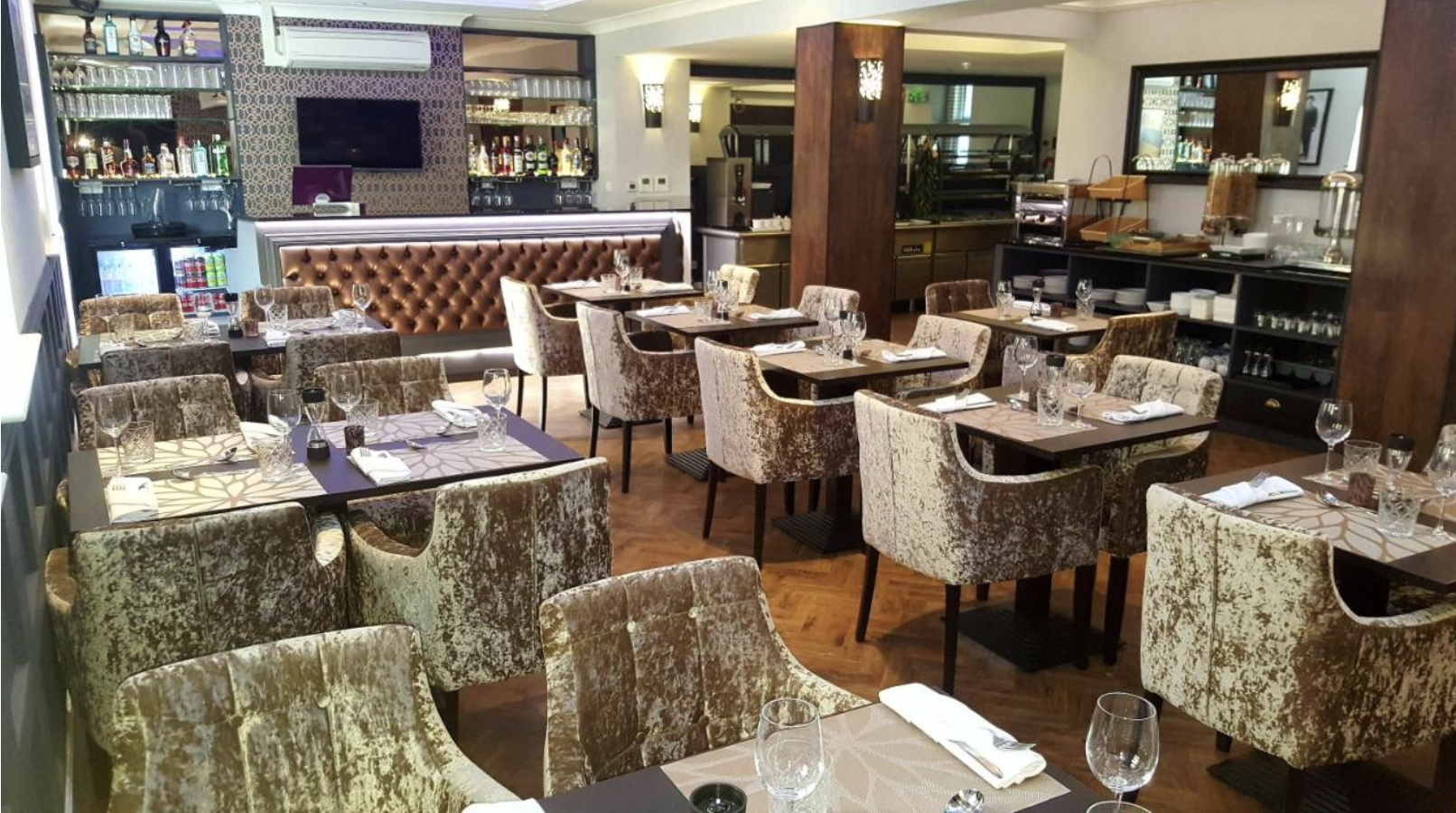 Elegant restaurant setting at Lansbury Heritage Hotel for intimate events and upscale dining.