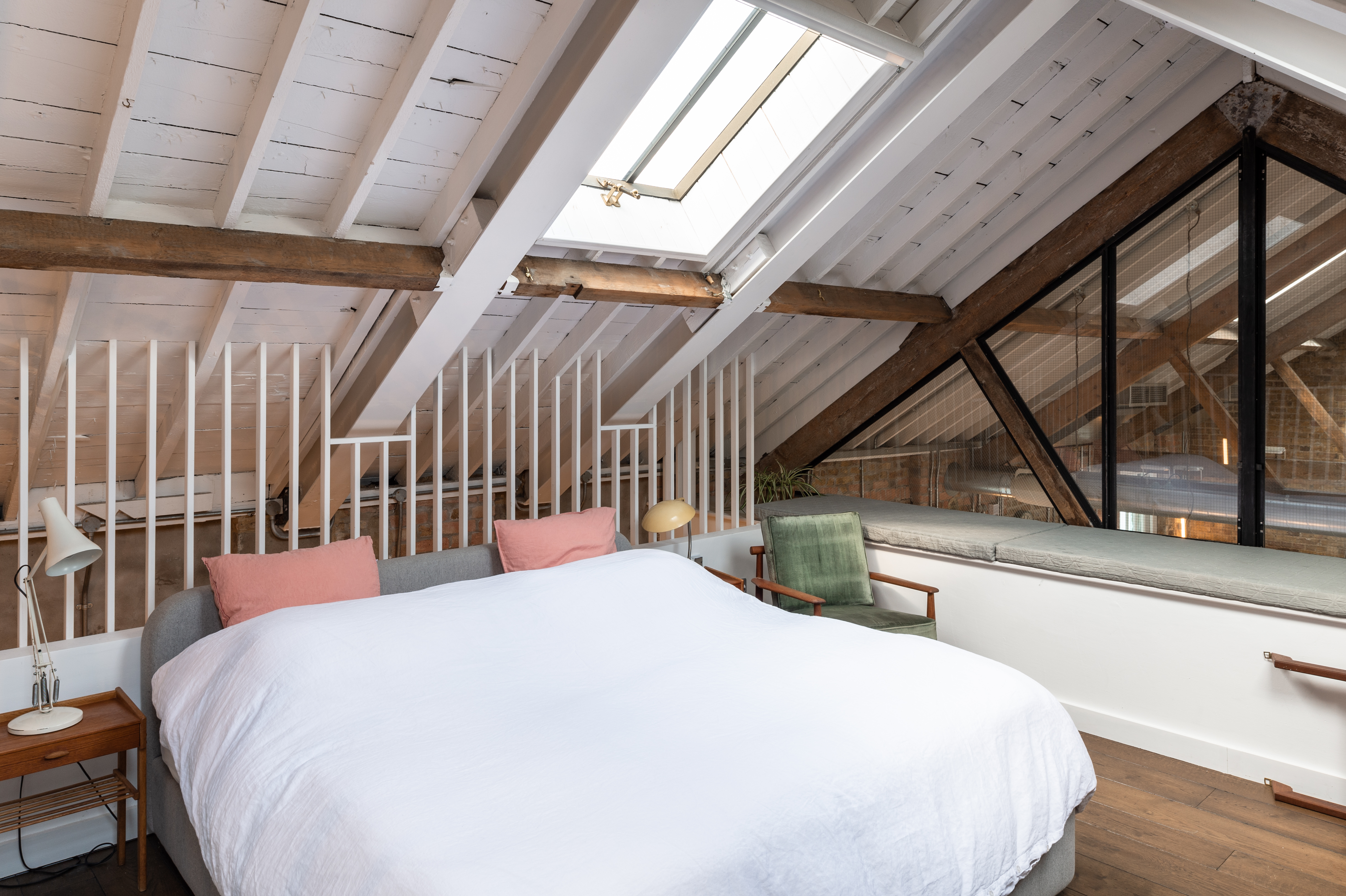 Modern bedroom at The Loft Studio, ideal for retreats and post-event relaxation.