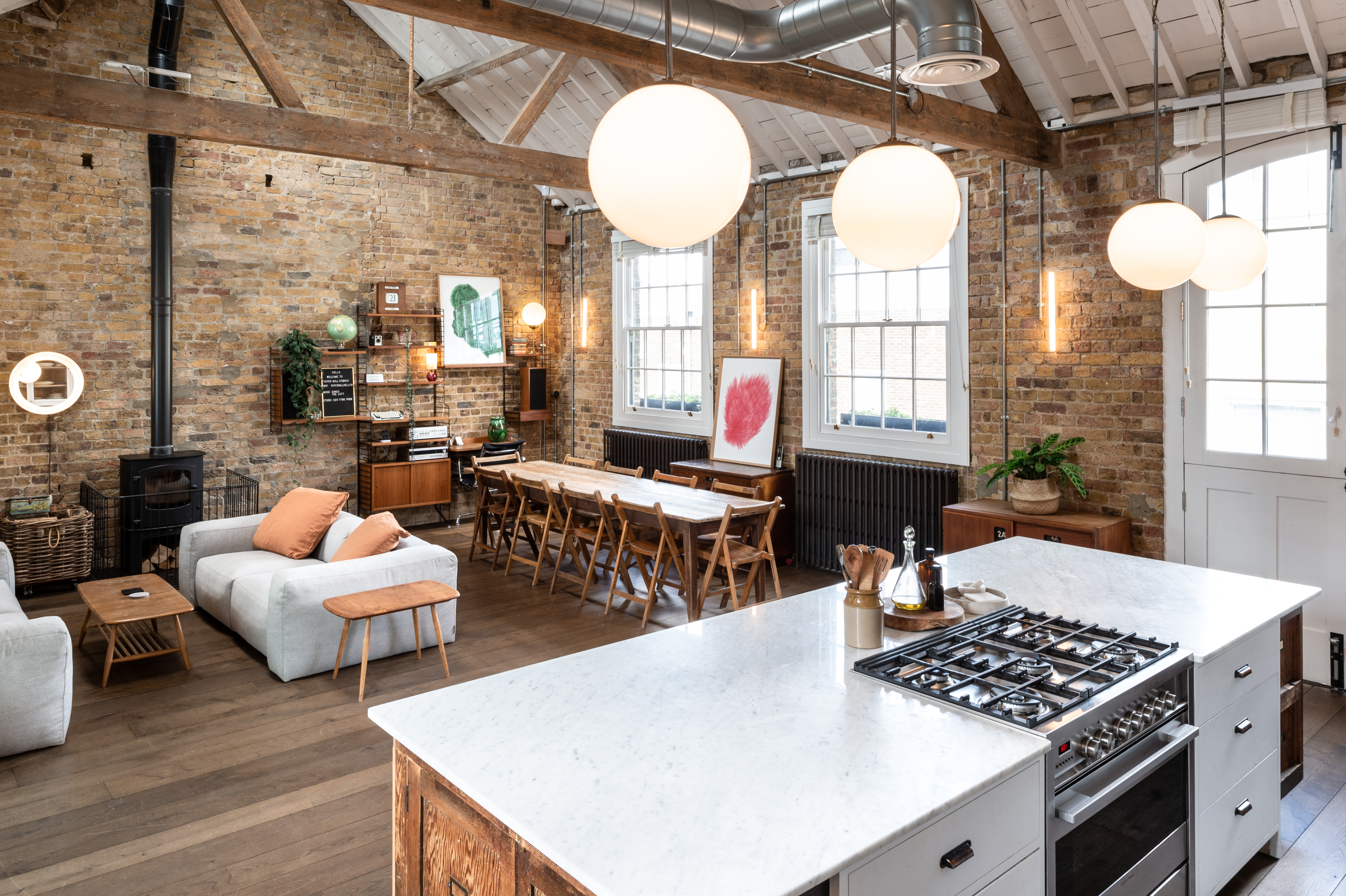 Stylish Loft Studio event space with natural light for gatherings and meetings.