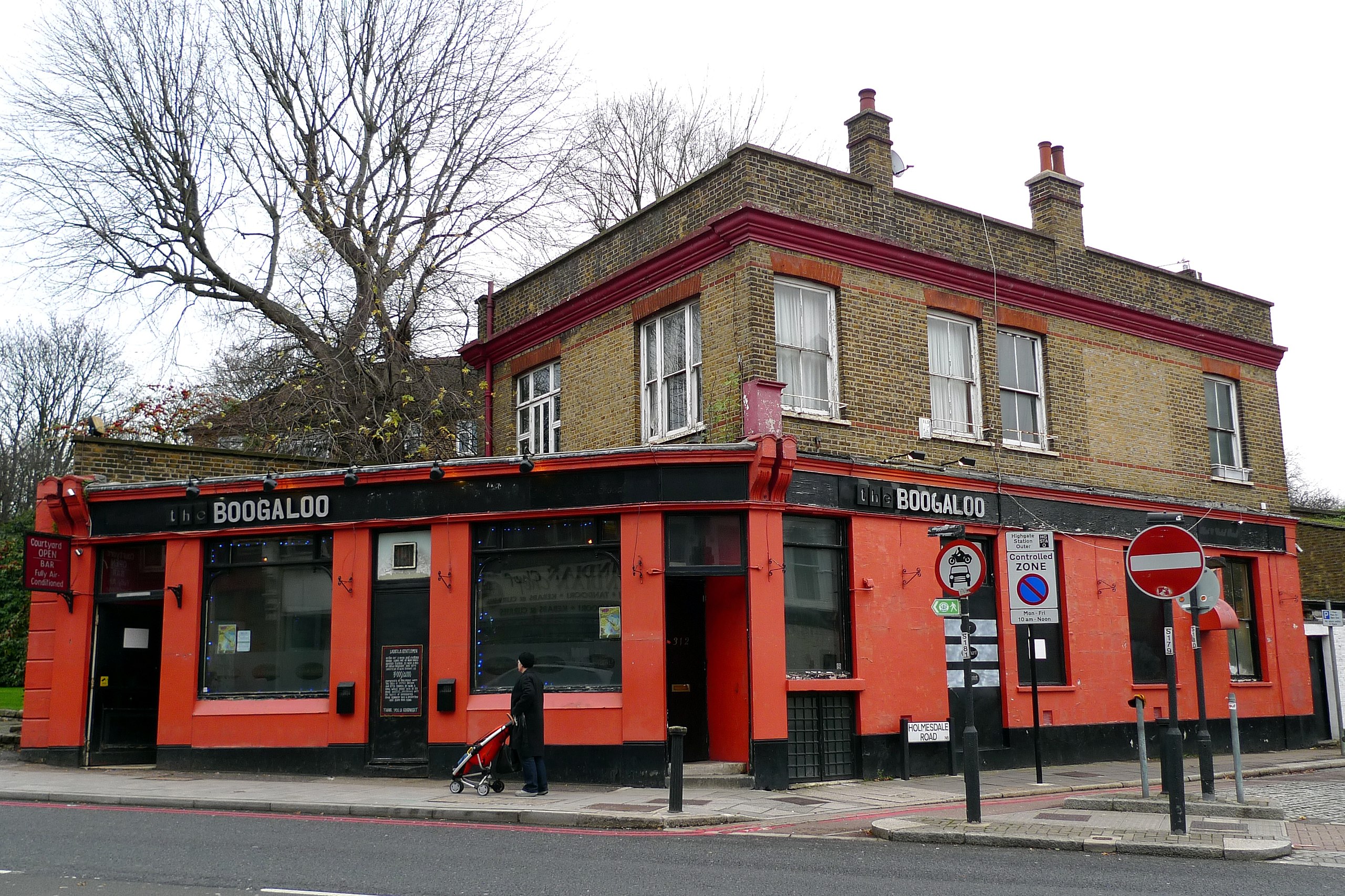 Vibrant Boogaloo Pub exterior, perfect for casual meetings and social events.