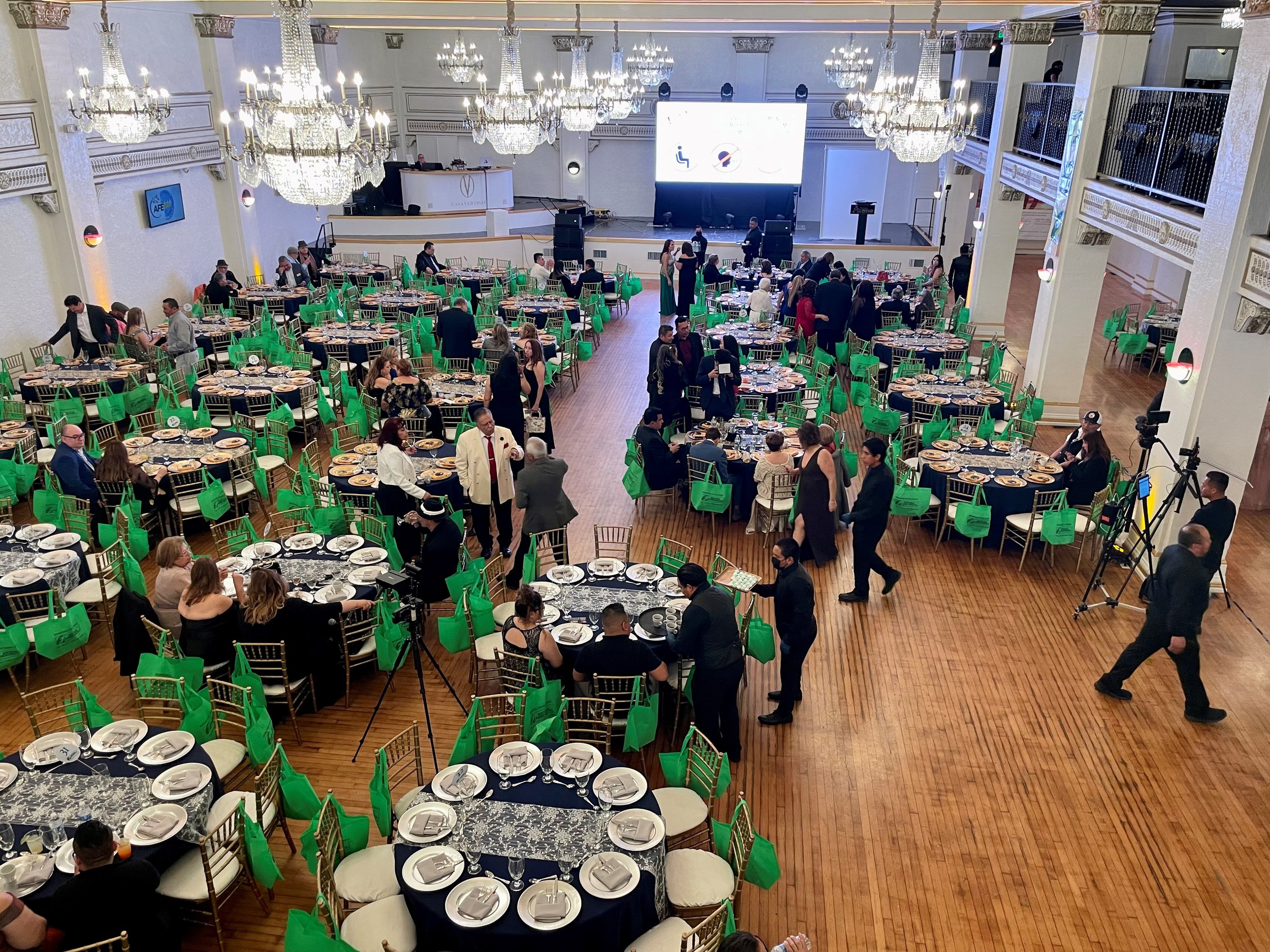 Event space at Casa Vertigo with blue and white decor, ideal for networking and presentations.