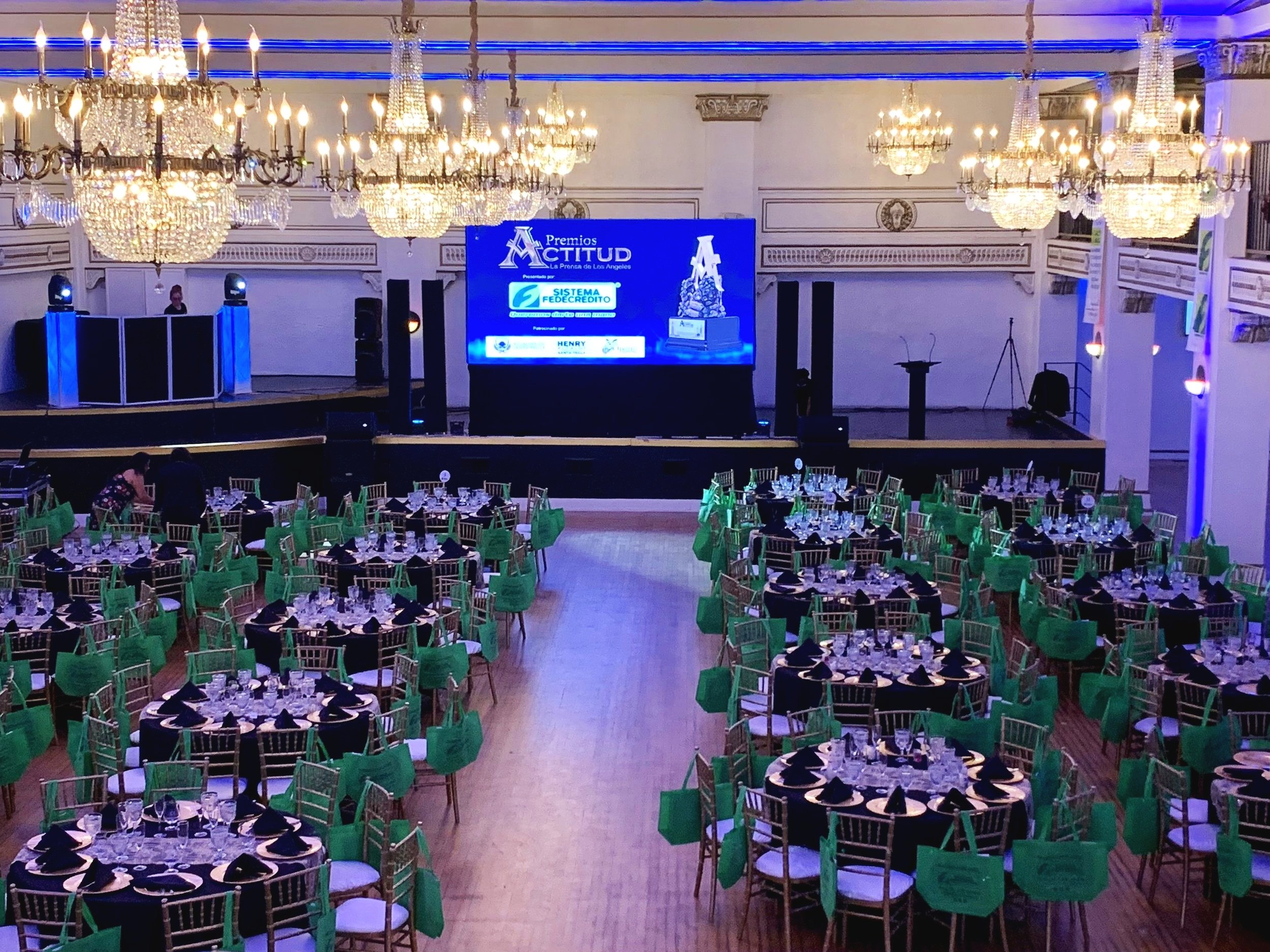 Elegant banquet hall at Casa Vertigo with round tables, ideal for corporate events and galas.