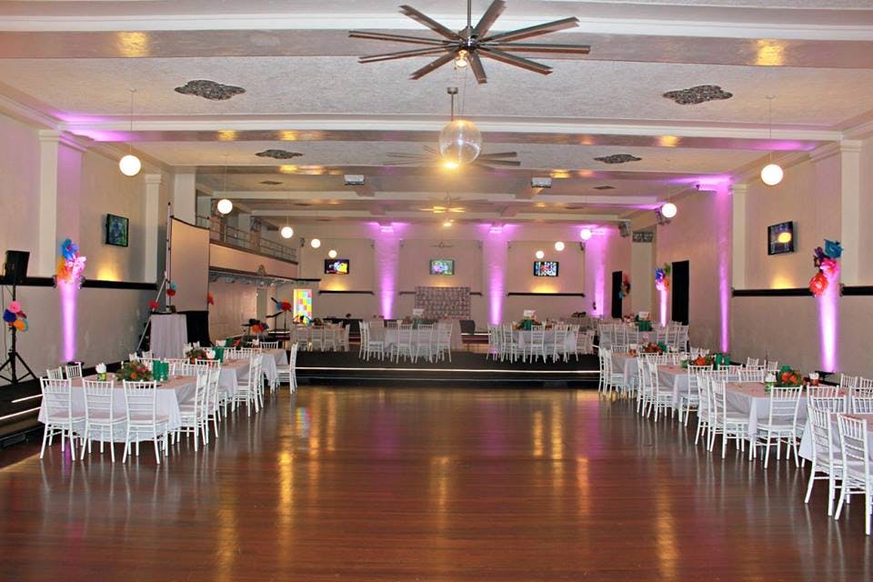 Spacious Casa Vertigo basement venue with elegant seating for formal events.
