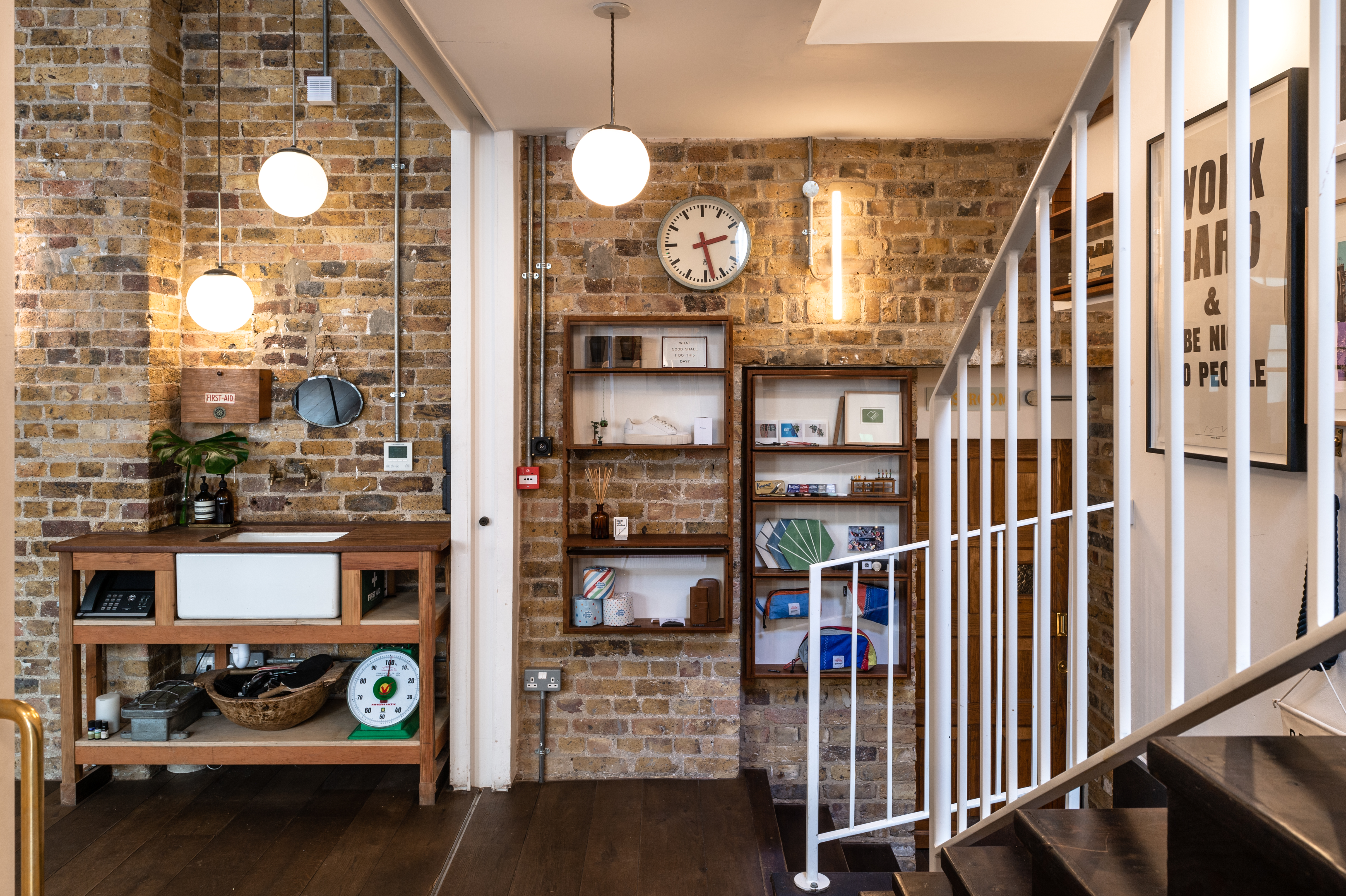 Stylish meeting space entrance with exposed brick, perfect for networking events.