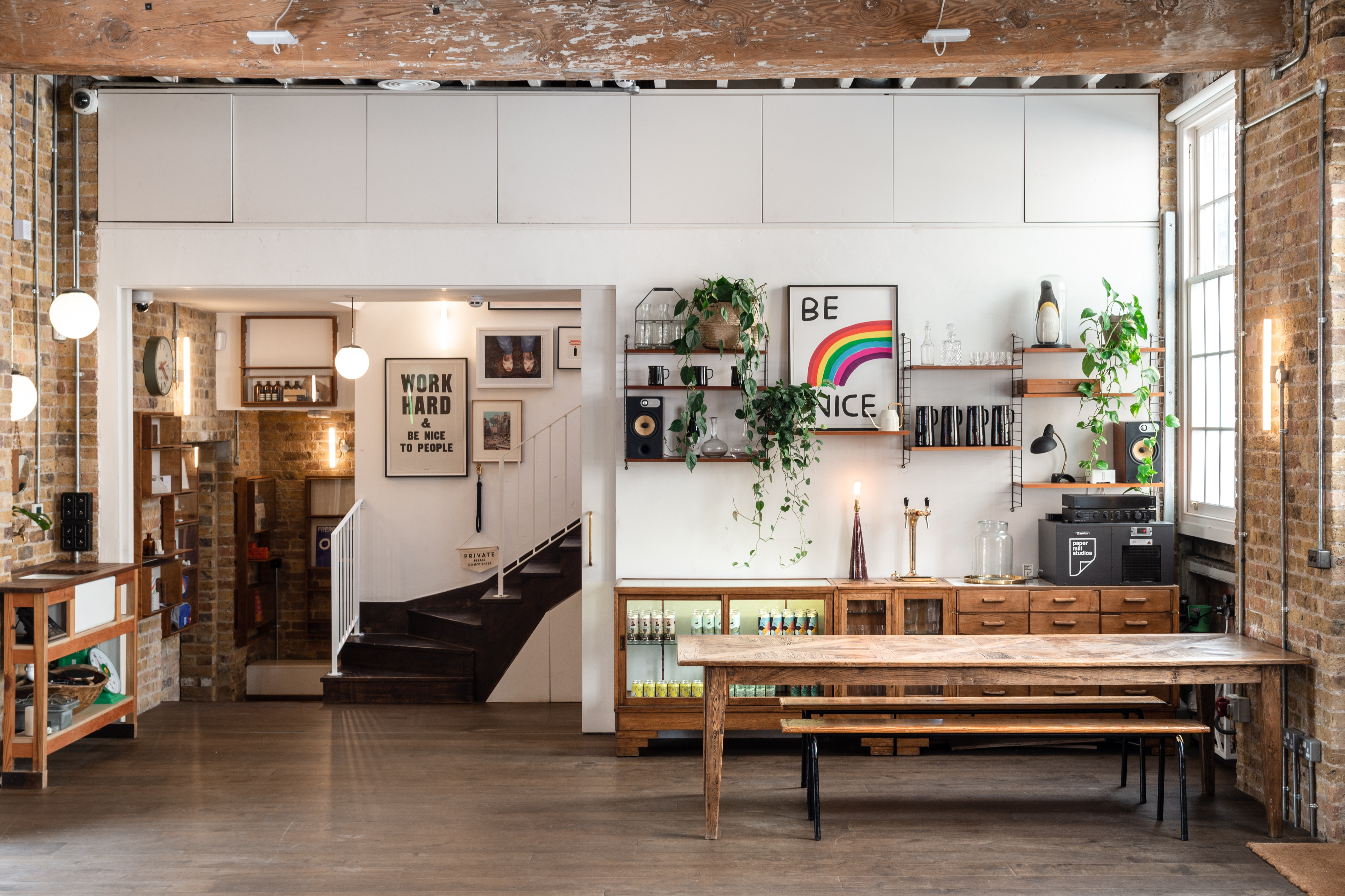 Stylish Paper Mill Studio with exposed brick, perfect for meetings and events.