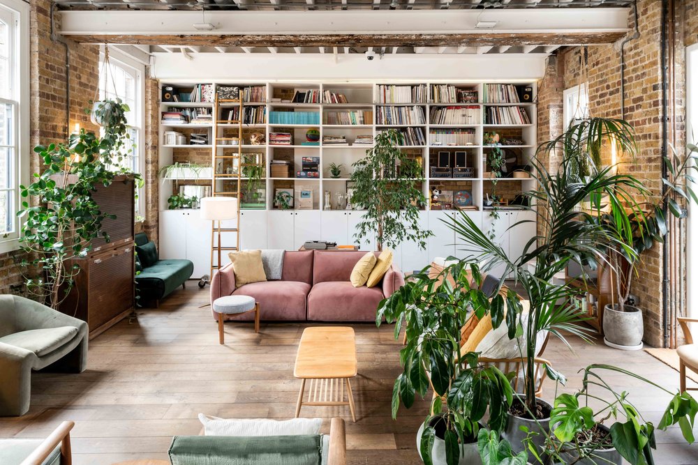Event space at Paper Mill Studio with cozy seating and greenery for workshops.
