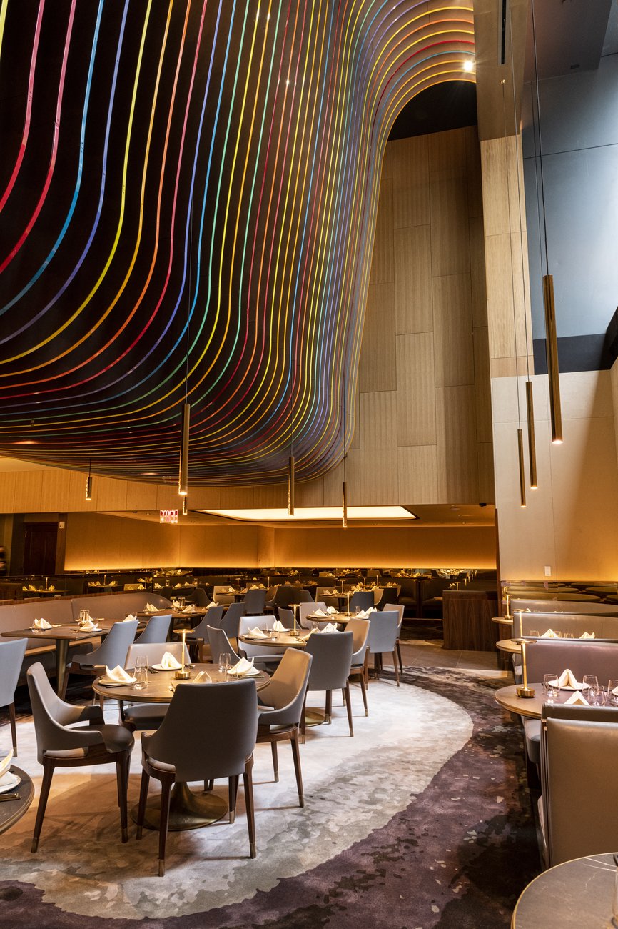 Main Dining Room at 53 Restaurant with vibrant ceiling, ideal for events and gatherings.