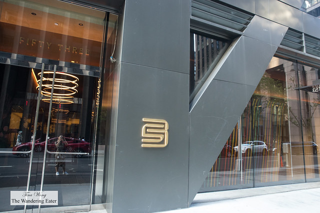 Sleek modern restaurant entrance, ideal for upscale corporate events and receptions.