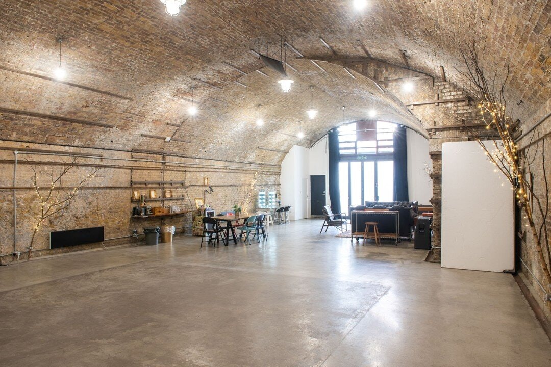 Glass House event space with arched ceiling, perfect for meetings and workshops.