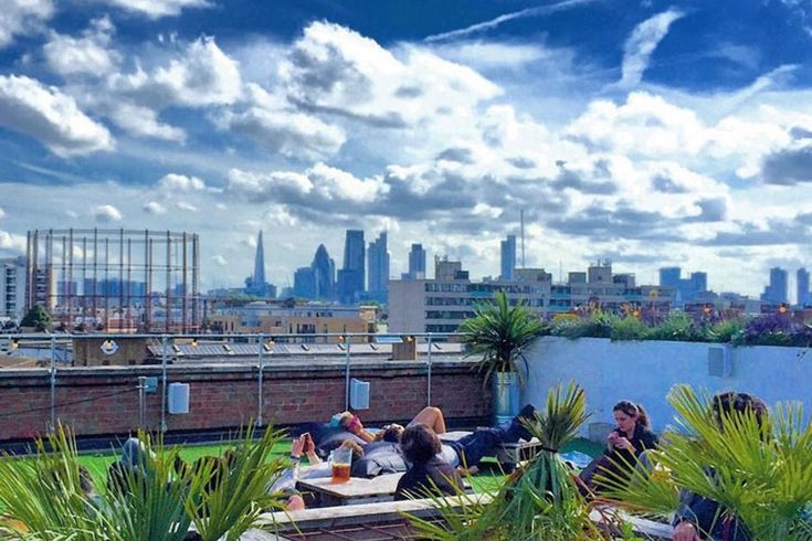 Vibrant Netil360 Rooftop Bar terrace with skyline, perfect for networking events and meetings.