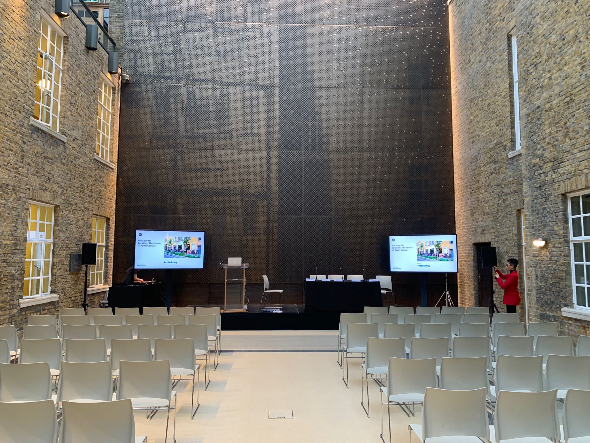 Modern event space in Hackney Venues with chairs and screens for conferences.