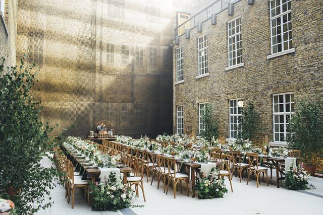 Outdoor event space in Hackney with floral centerpieces, ideal for weddings and gatherings.