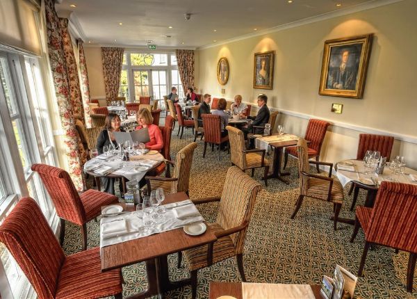 West Lodge Park Suite dining area, elegant decor for intimate meetings and events.