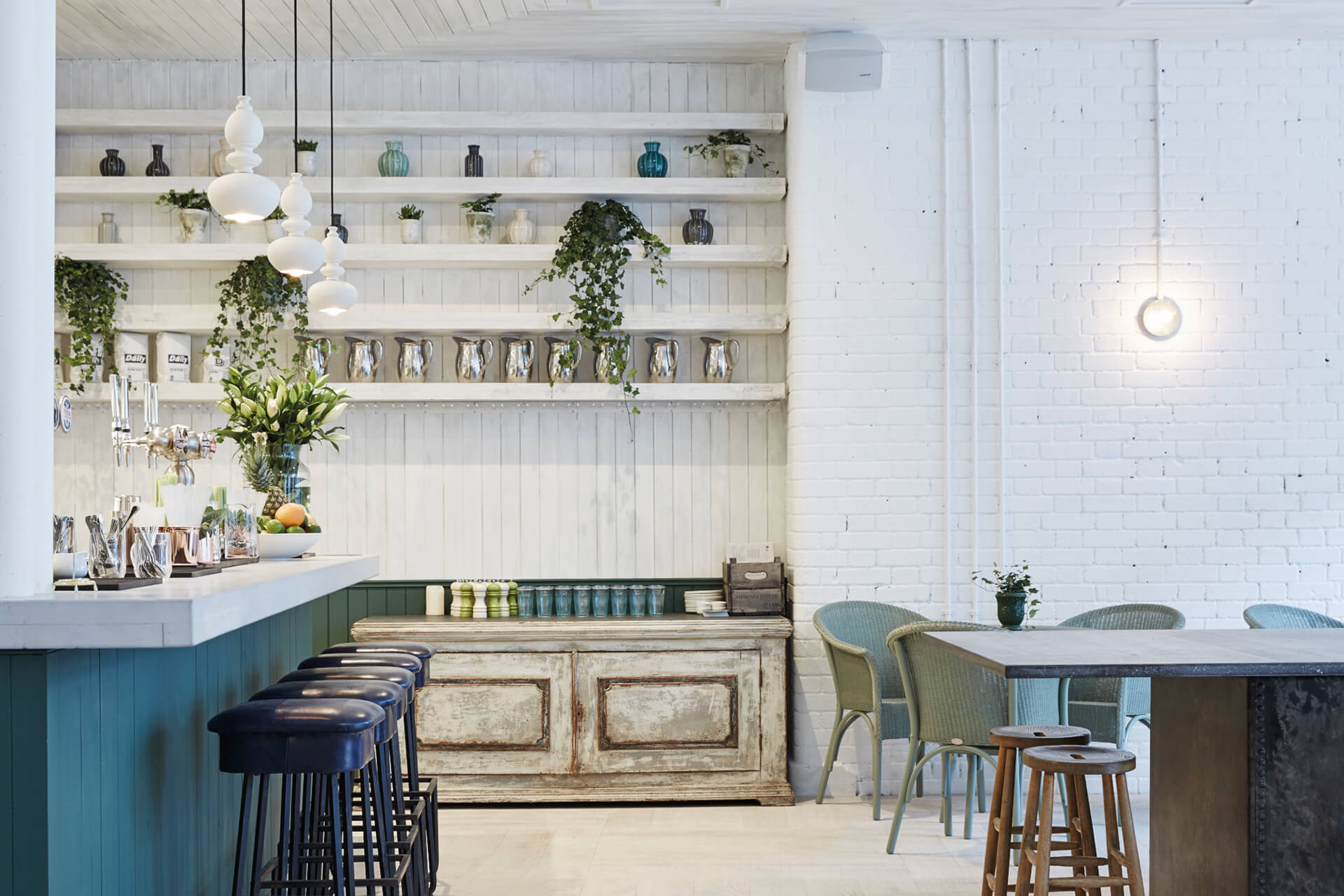 Private dining room with minimalist decor, ideal for intimate gatherings and networking events.