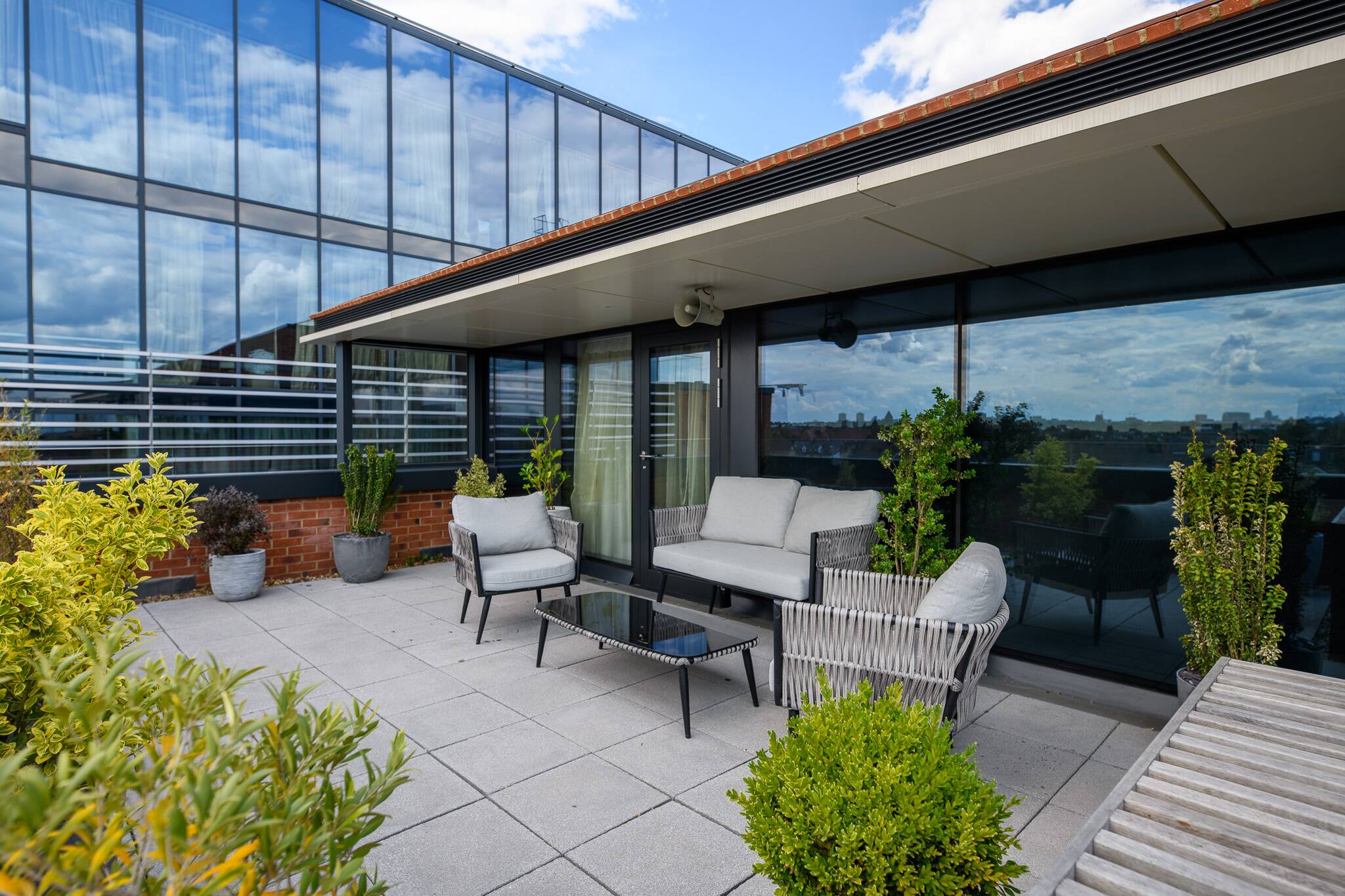 Stylish outdoor terrace at Dao by Dorsett, ideal for networking events and meetings.