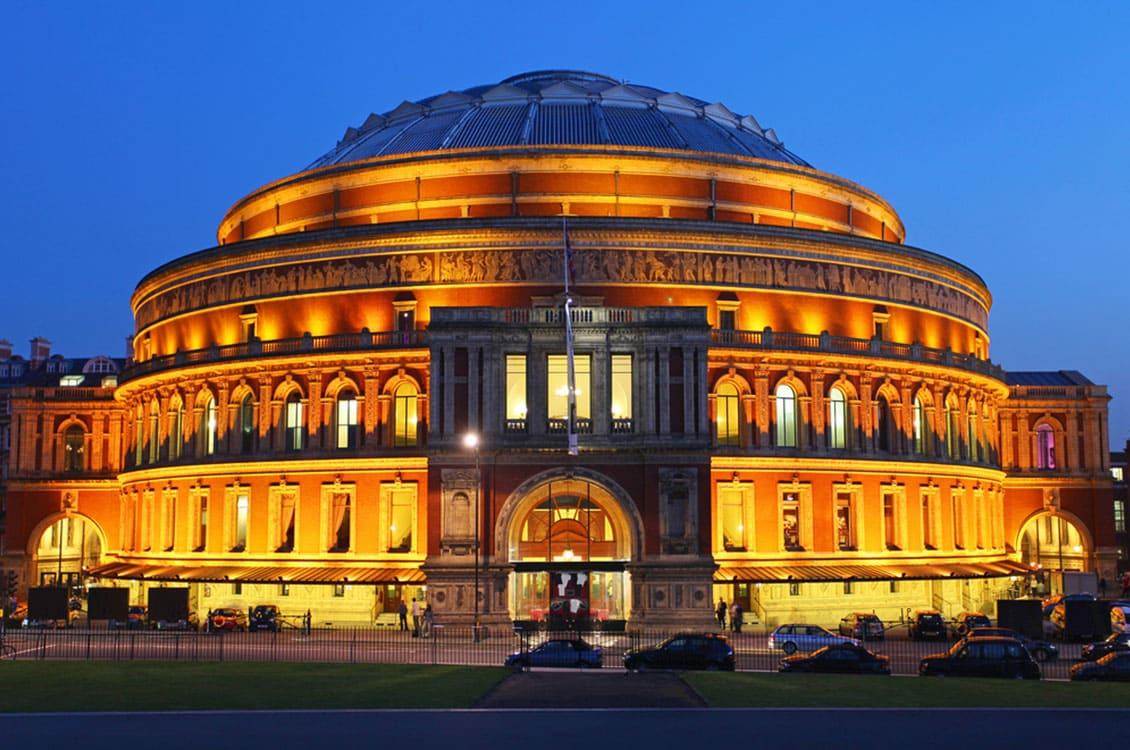 Royal Albert Hall at dusk, showcasing iconic architecture for concerts and events.