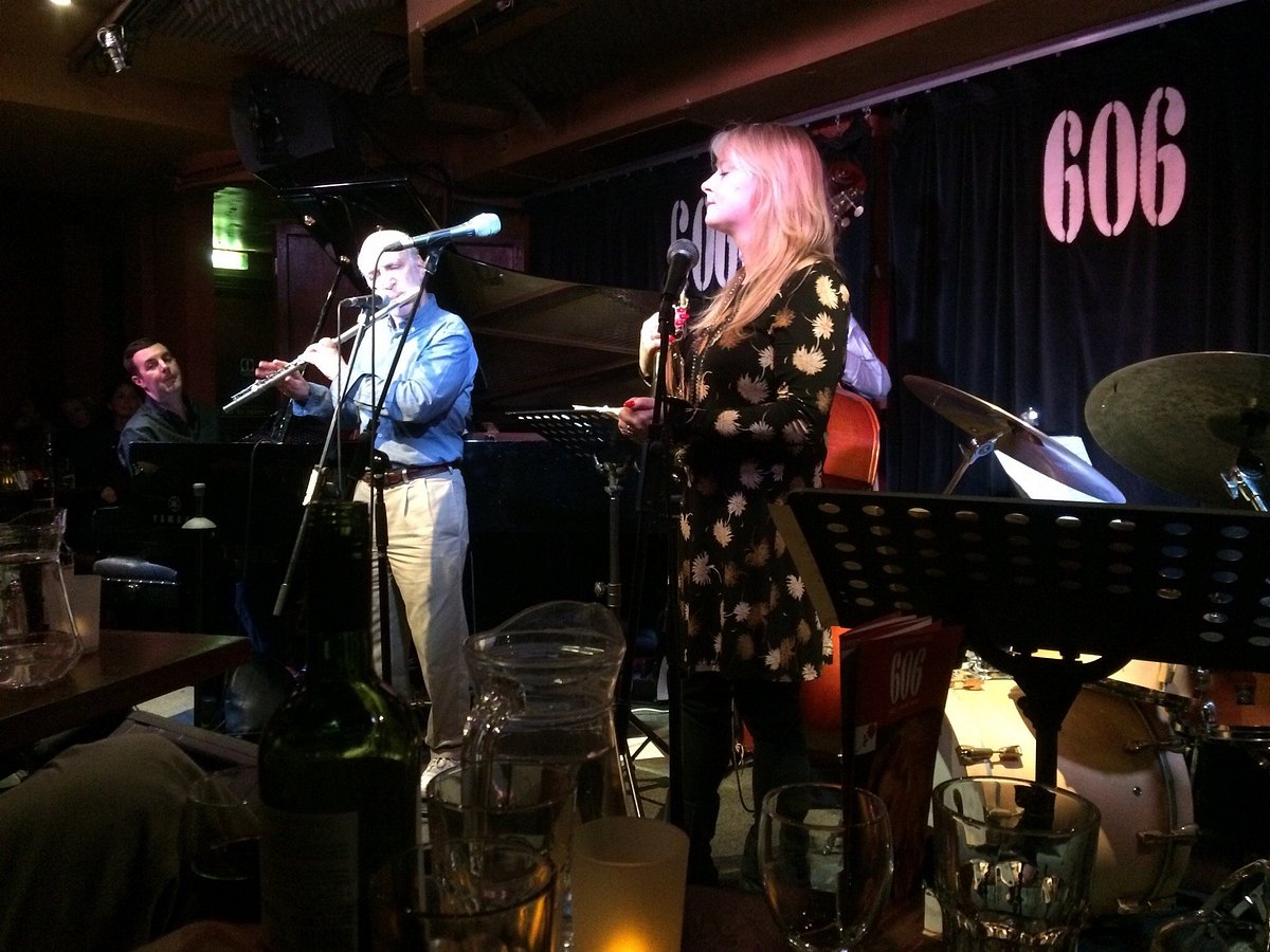 Live music performance in 606 Club's cozy Main Room, ideal for networking events.