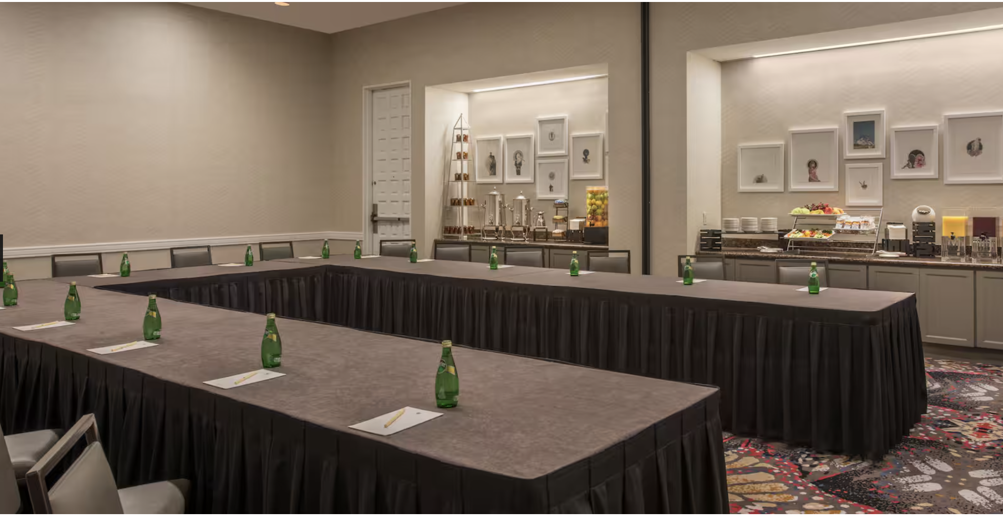 Meeting room at DoubleTree by Hilton Austin, featuring a rectangular table setup for corporate events.
