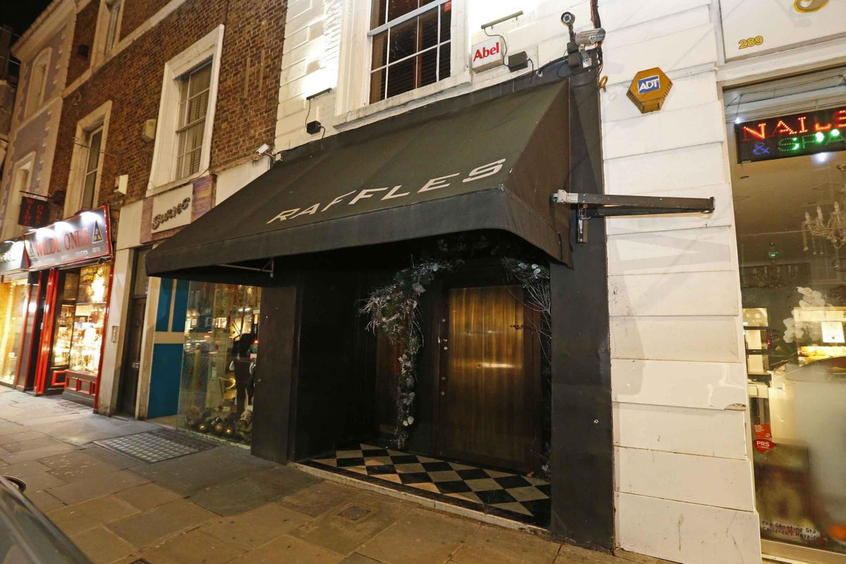 Sophisticated Chelsea nightclub entrance with checkered floors for VIP events and private receptions.