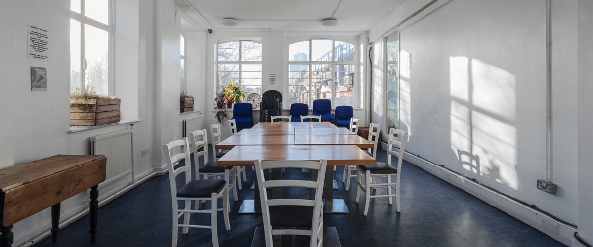 Bright meeting space at Vauxhall Gardens Community Centre for events and collaboration.