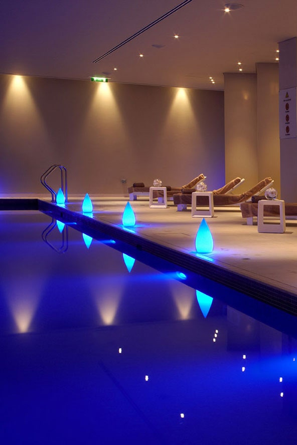 Mandara Spa pool area with ambient blue lighting for wellness events in London.