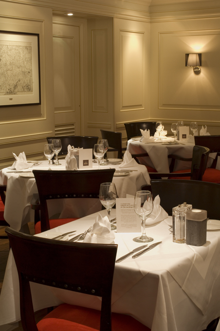 Elegant dining area at Londinium Restaurant, ideal for upscale events and meetings.