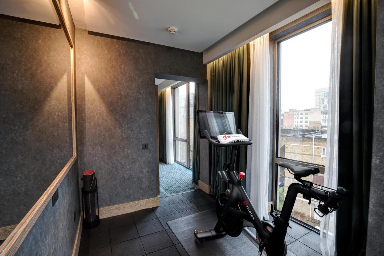 Modern hotel gym with stationary bike, ideal for wellness-focused events.