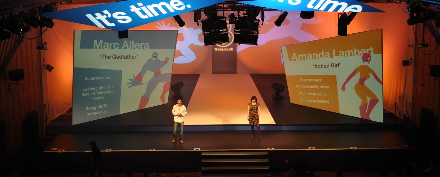 The Great Hall at Imperial College with vibrant corporate event stage setup.