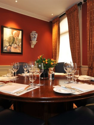 Elegant meeting room at Bentley's Oyster Bar, perfect for intimate gatherings and negotiations.