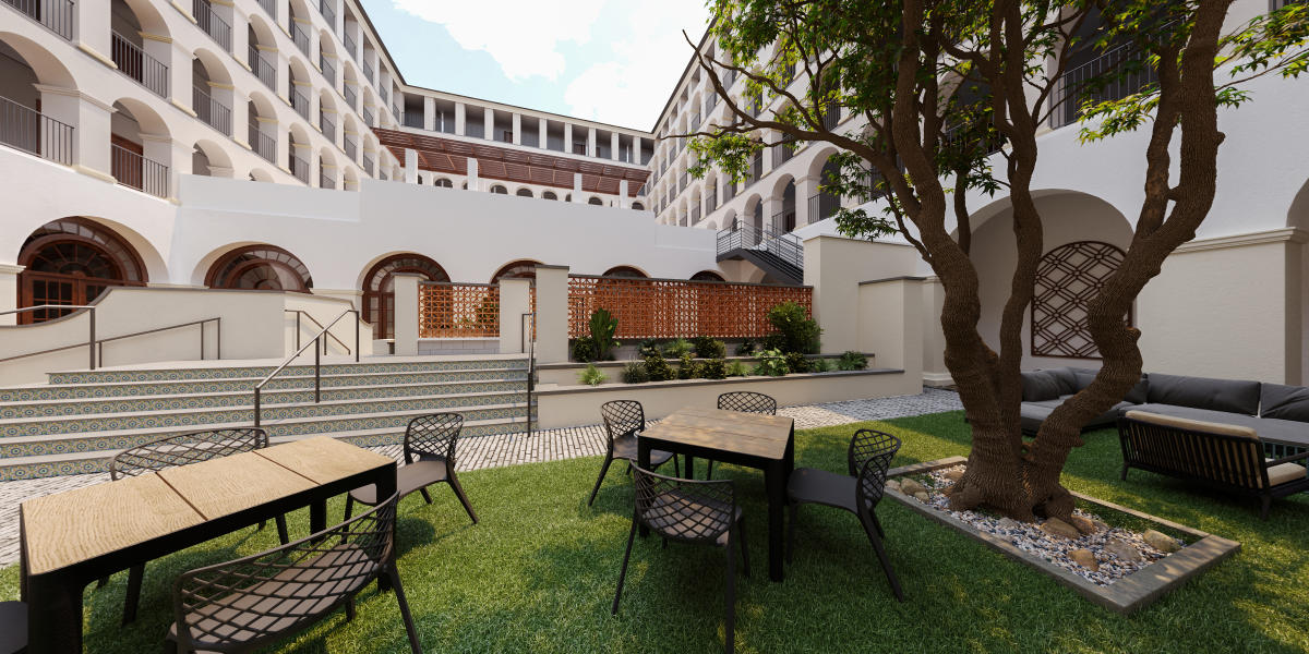 Outdoor courtyard at DoubleTree by Hilton Austin, perfect for networking events and meetings.