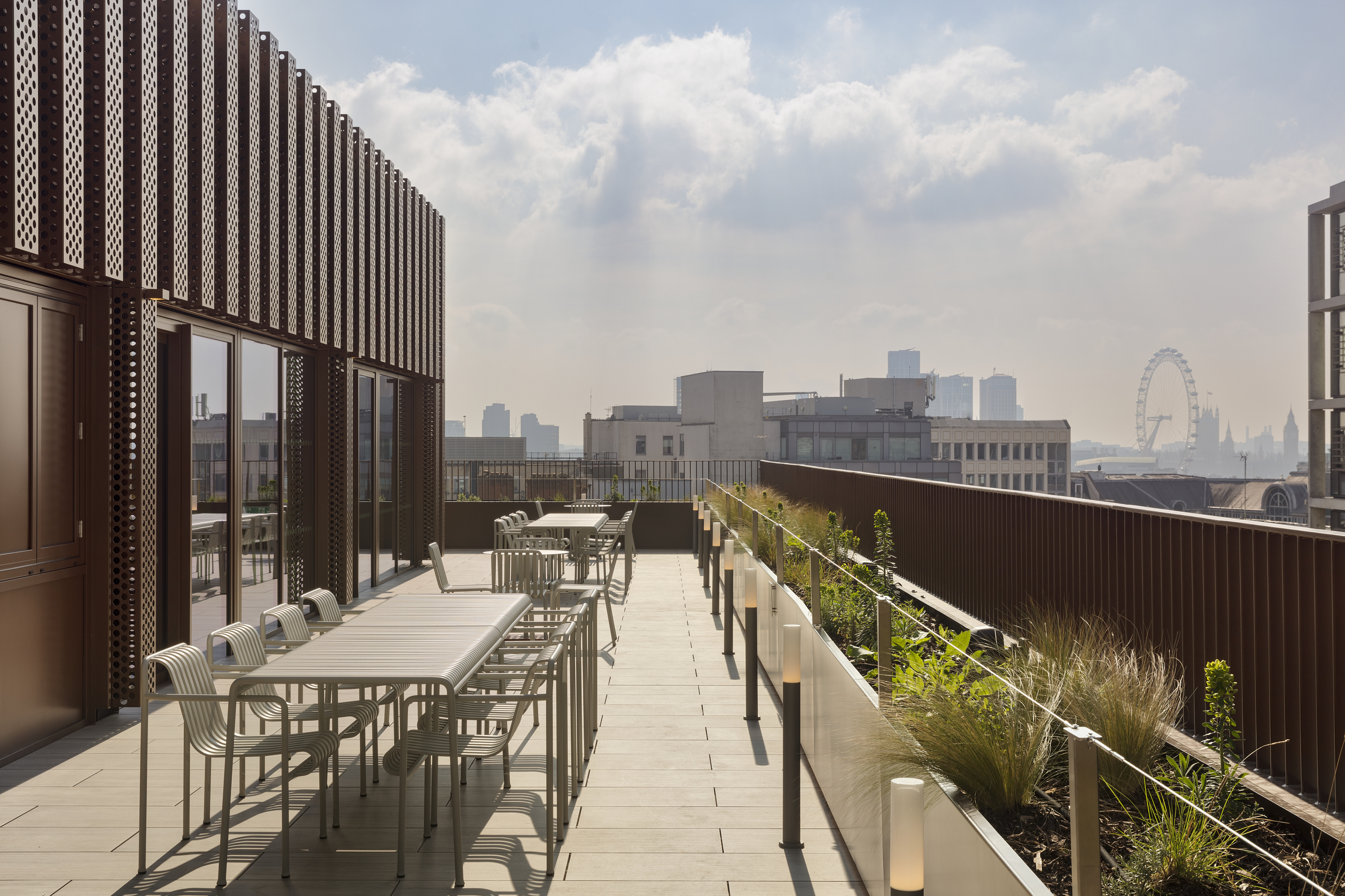 Stylish rooftop terrace at Sixth Floor Lounge, ideal for outdoor meetings and events.