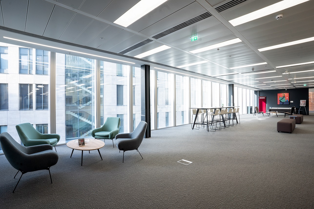 Modern 2nd Floor Lounge in London Conference Centre, ideal for meetings and networking.