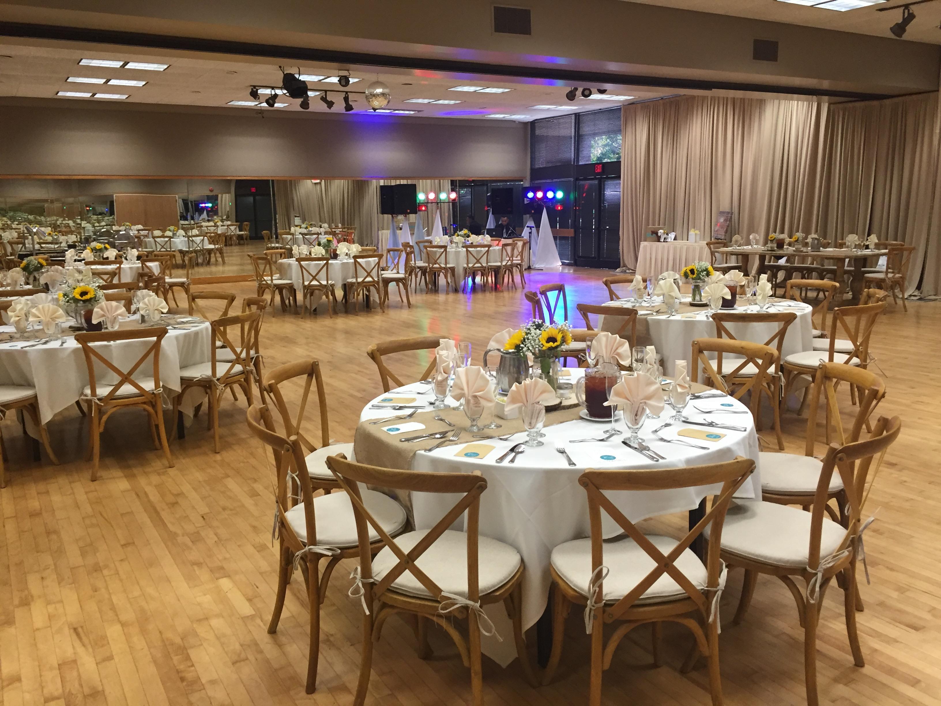 Elegant banquet setup at Clark Street Terrace with round tables and soft lighting.