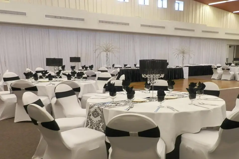 Elegant event space at Carson Community Center with white linens, perfect for weddings and corporate events.