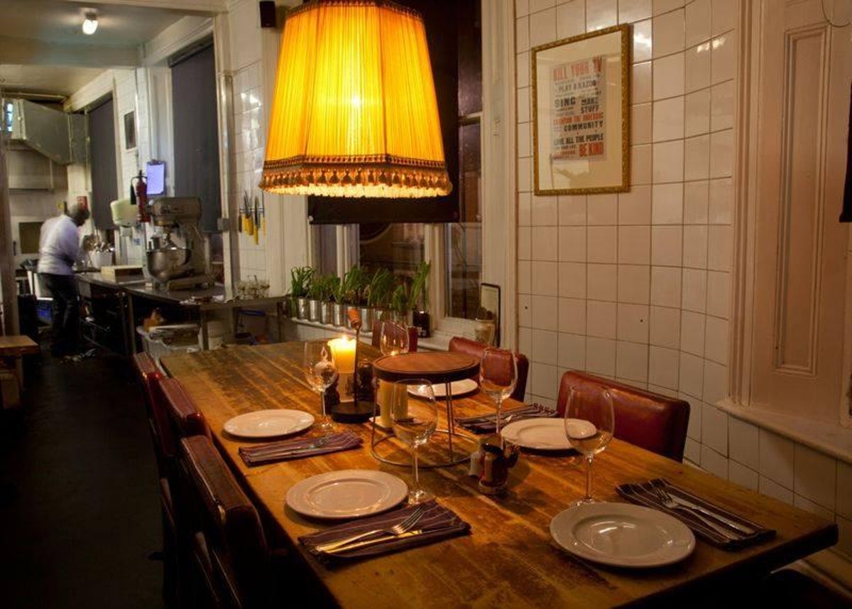 Warmly lit dining room at The Mall Tavern, ideal for intimate gatherings and events.